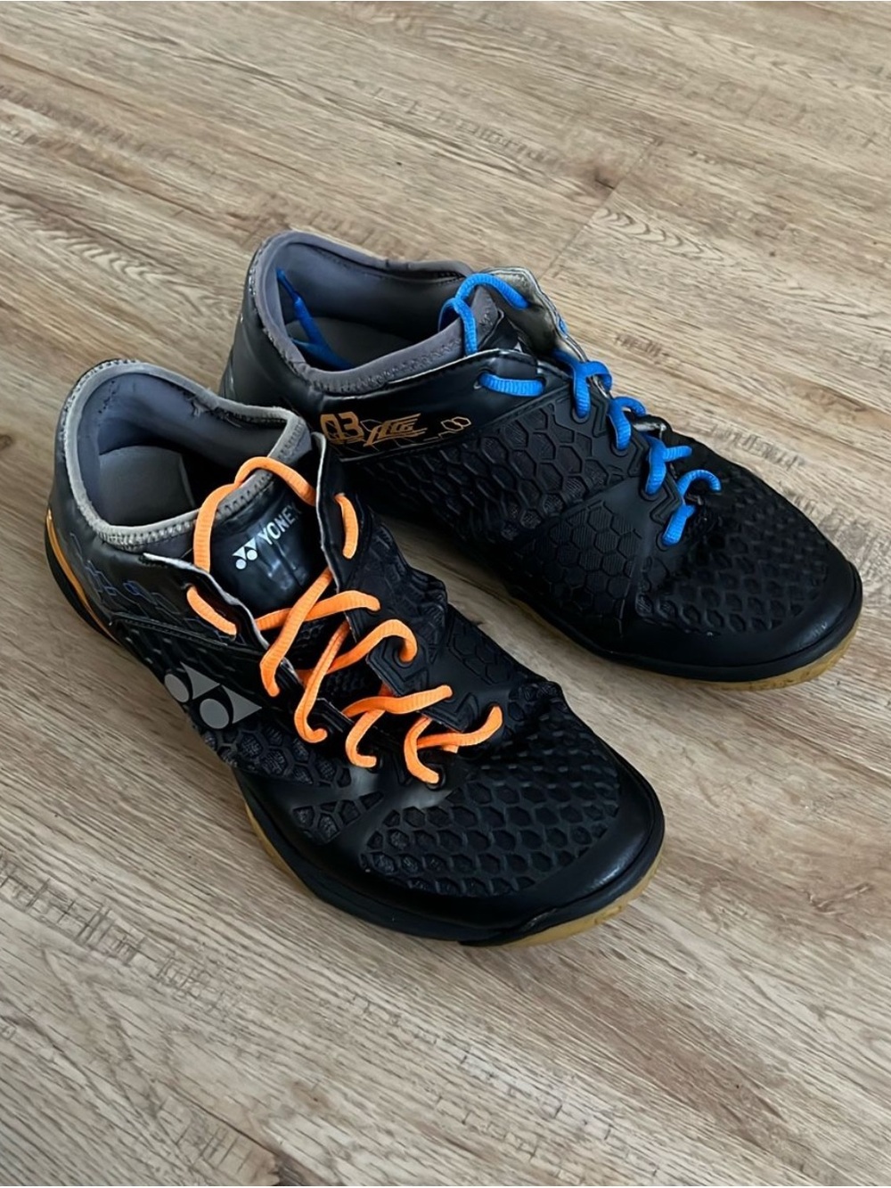 Yonex Men's Black Athletic Shoes with Orange and Blue Accents